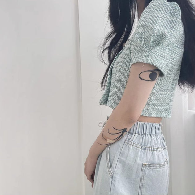 CROSS BUTTON KNIT TOP - Aumori