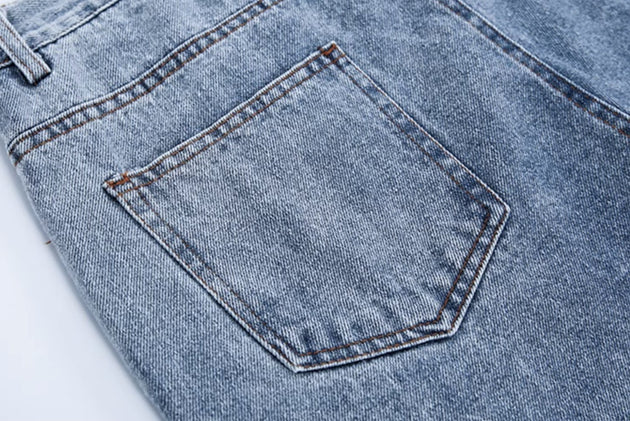 DISTRESSED SPLIT JEANS - Aumori