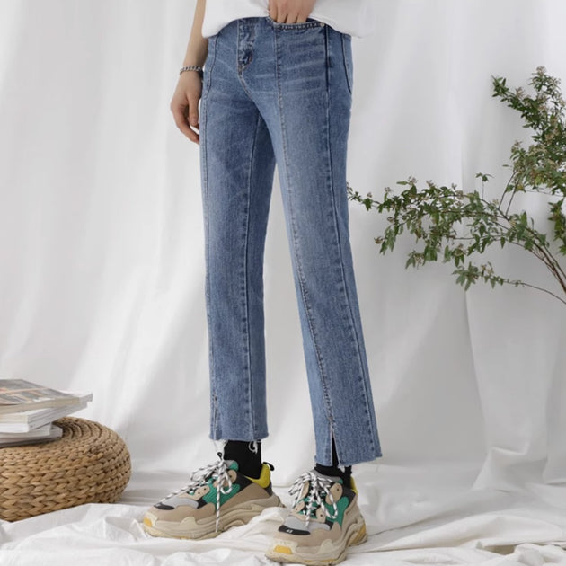 DISTRESSED SPLIT JEANS - Aumori