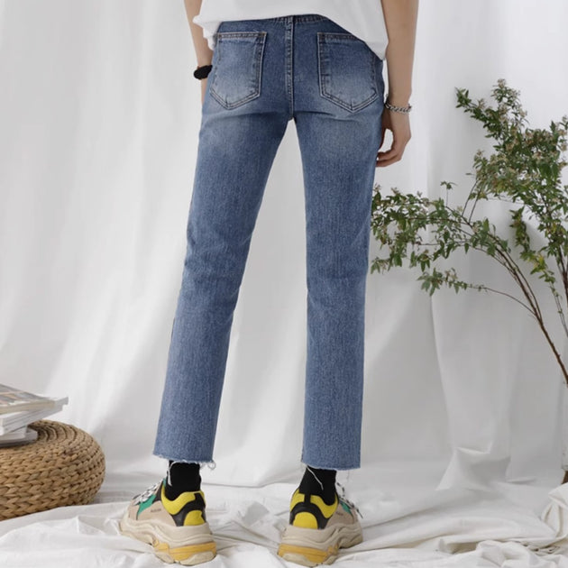 DISTRESSED SPLIT JEANS - Aumori