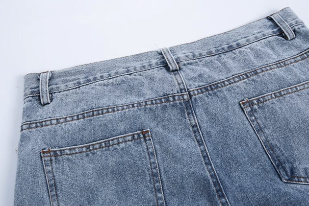 DISTRESSED SPLIT JEANS - Aumori