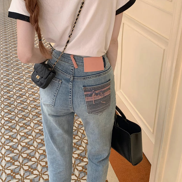 HIGH RISE ANKLE JEANS - Aumori