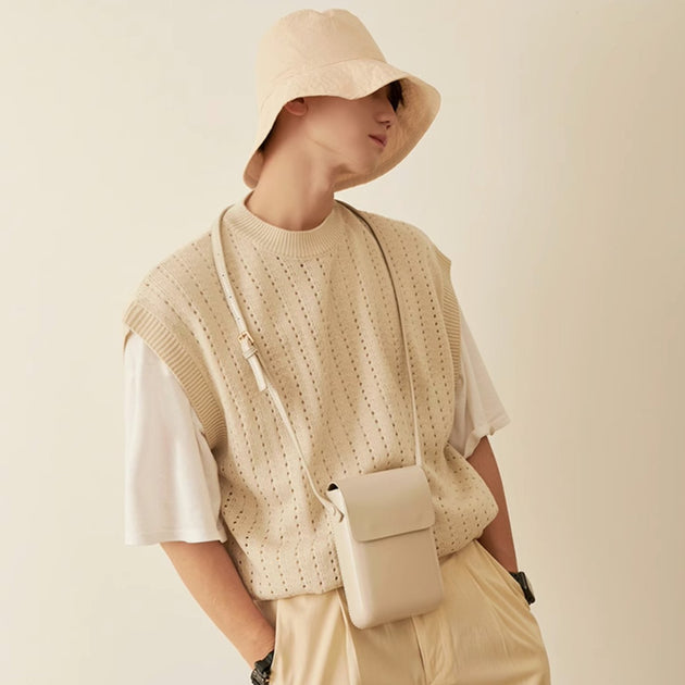 KNITTED SLEEVELESS VEST - Aumori