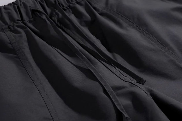 LOOSE STRETCH PANTS - Aumori