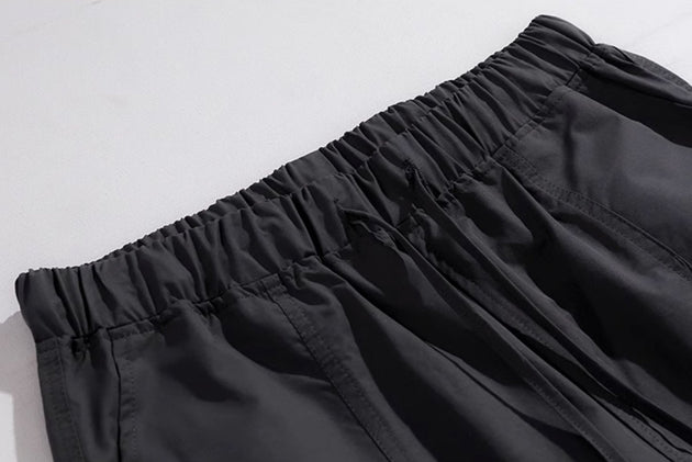 LOOSE STRETCH PANTS - Aumori