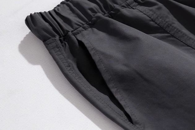 LOOSE STRETCH PANTS - Aumori