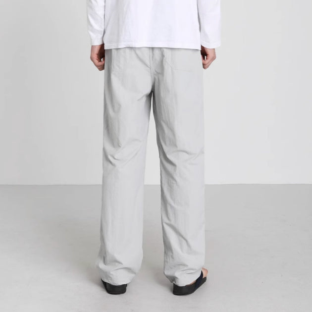 LOOSE STRETCH PANTS - Aumori