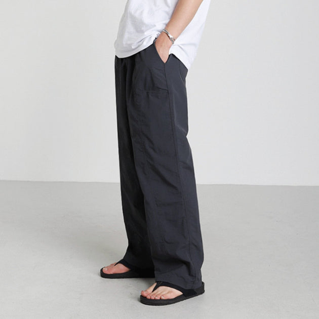 LOOSE STRETCH PANTS - Aumori