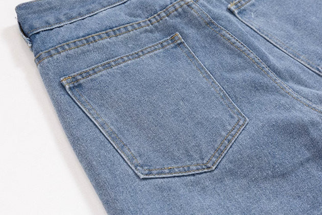 PATCHED RIPPED JEANS - Aumori