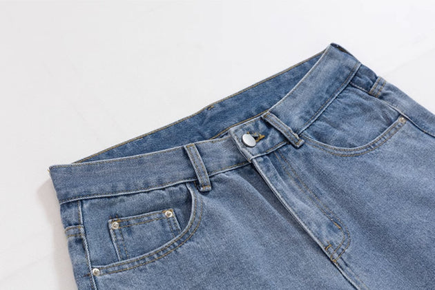 PATCHED RIPPED JEANS - Aumori