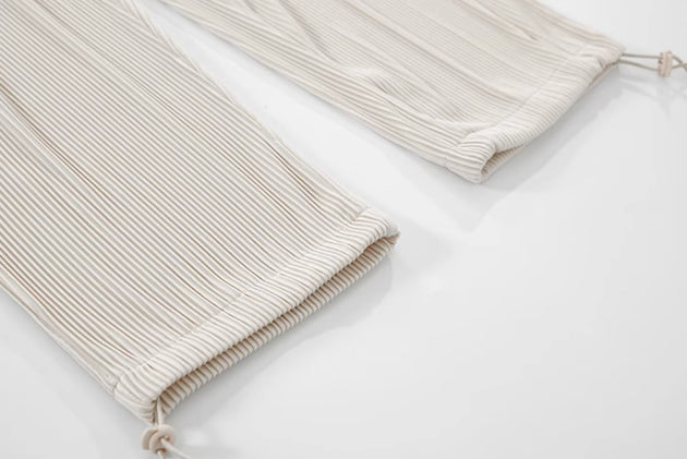 PLEATED ANKLE PANTS - Aumori