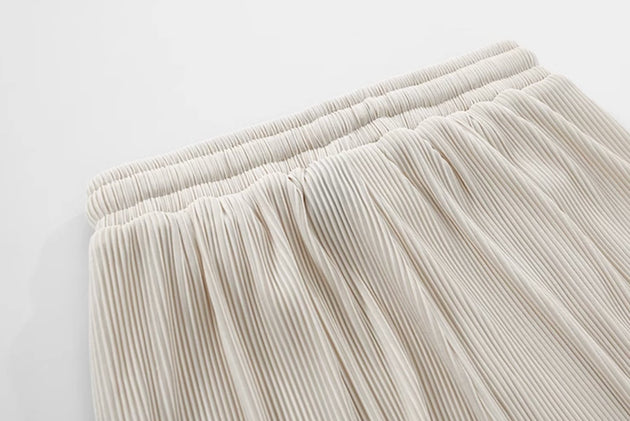 PLEATED ANKLE PANTS - Aumori