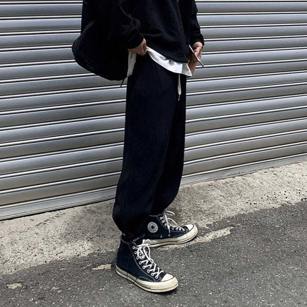 PLEATED ANKLE PANTS - Aumori