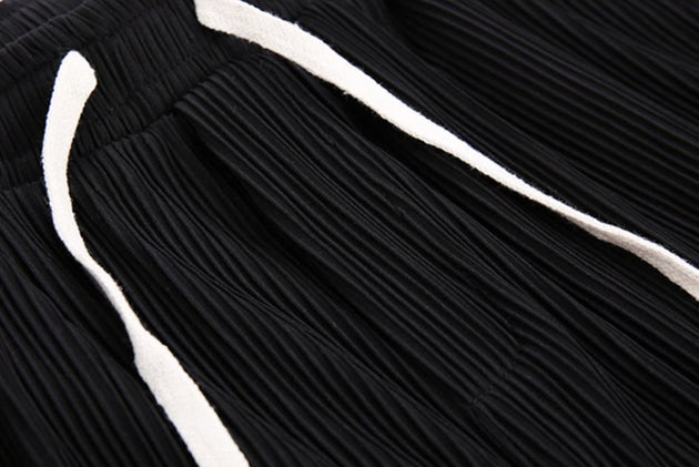 PLEATED DRAWSTRING PANTS - Aumori