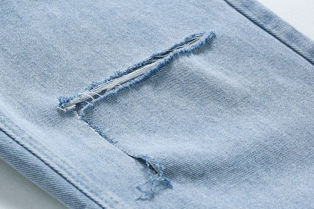 RIPPED JEANS - Aumori