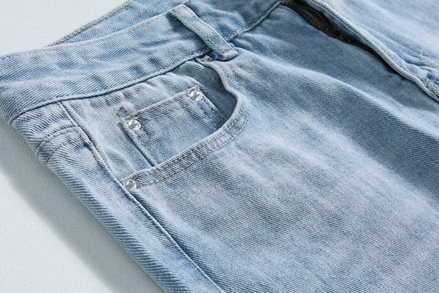 RIPPED JEANS - Aumori