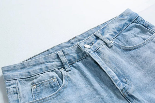 RIPPED JEANS - Aumori