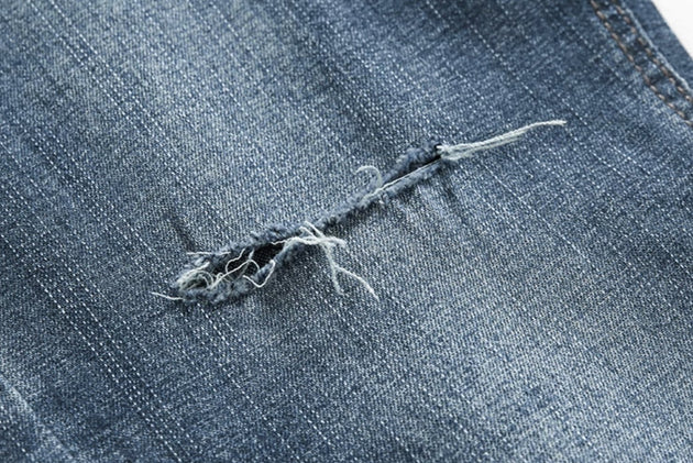 RIPPED SKINNY JEANS - Aumori