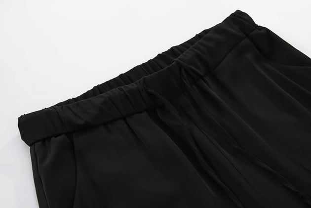 STRAIGHT LOOSE PANTS - Aumori
