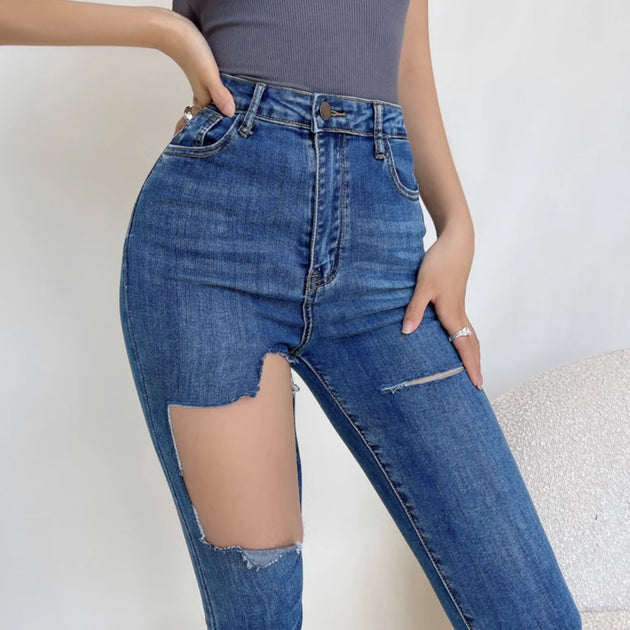 RIPPED TIGHT JEANS - Aumori