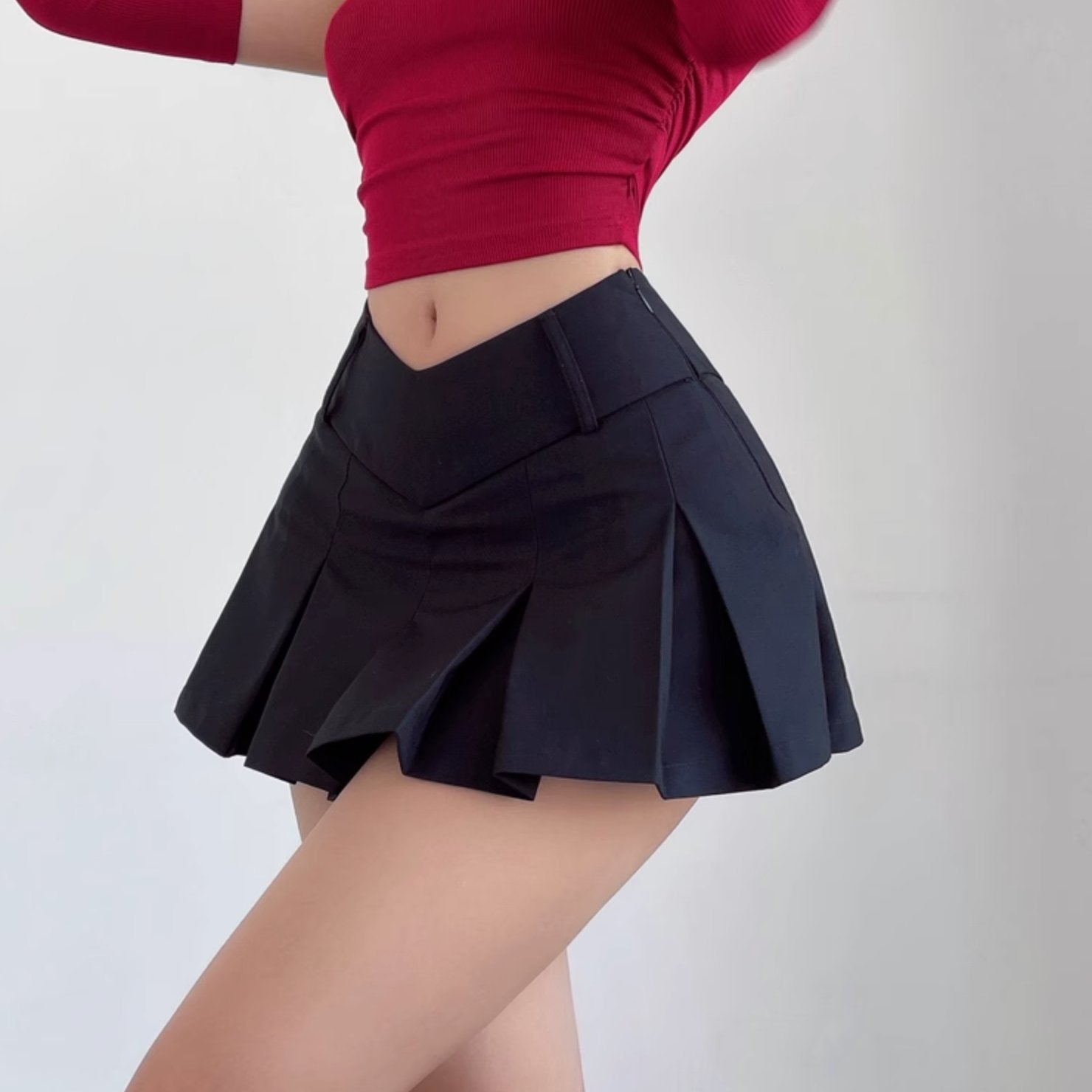 V-SHAPED FOLDED SKIRT - Stockbay